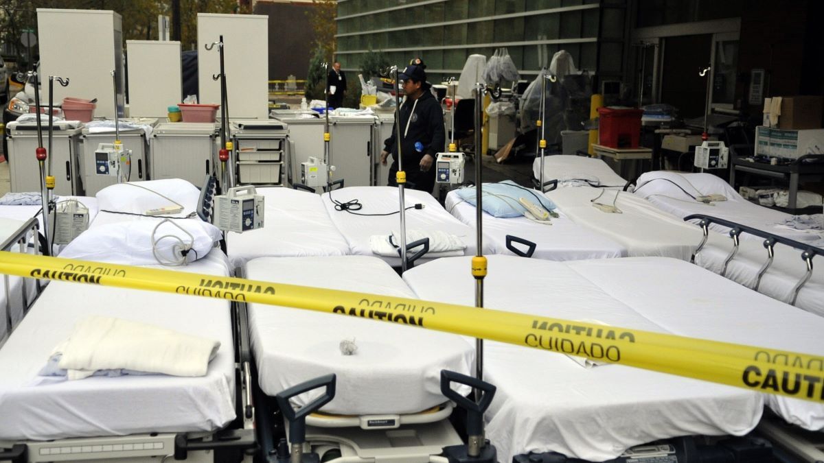 Hospital beds are brought outside of Hoboken University Hospital as the cleanup from the damage done from Hurricane Sandy begins October 31, 2012 in Hoboken, New Jersey.