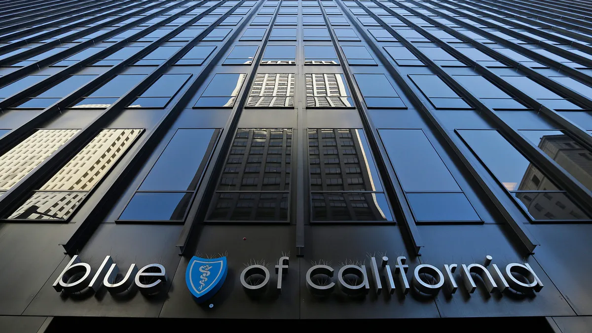 Blue Shield of California's logo above the entrance to its headquarters.