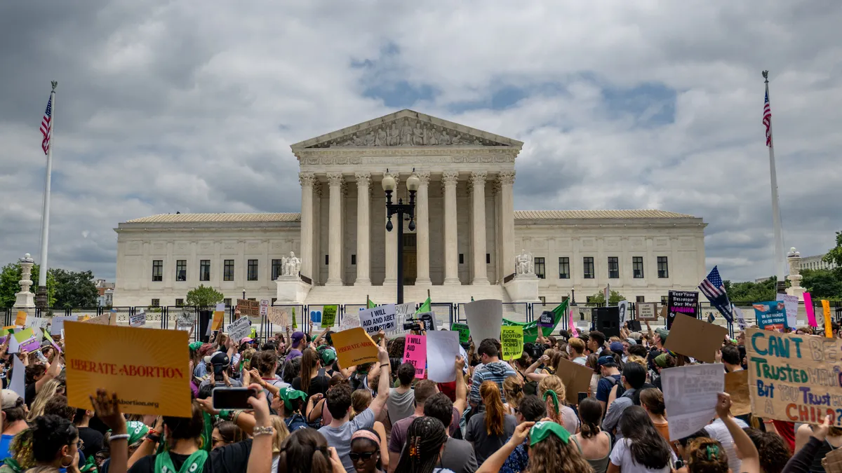 Protestors demonstrate in front of the US Supreme Court building